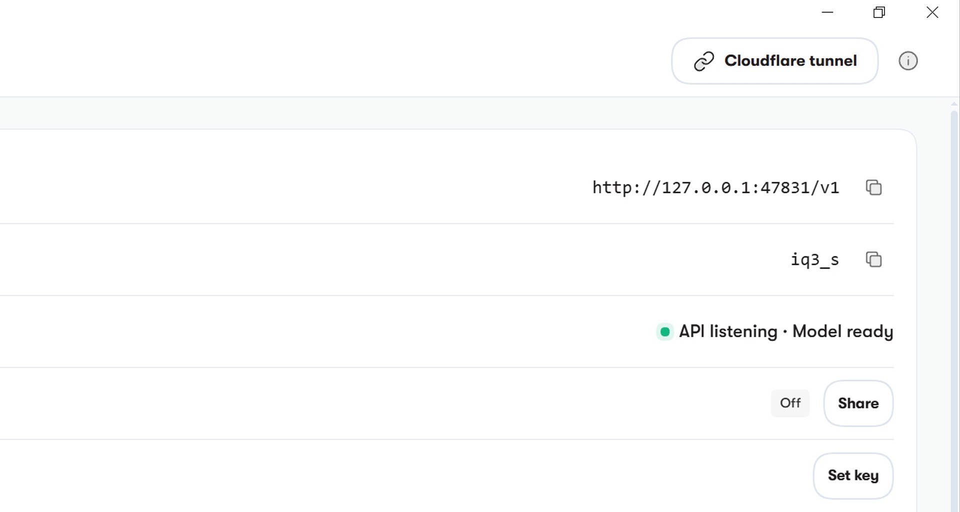 Strata's Serving page: the local address, the model name iq3_s, and API listening · Model ready. Network sharing stays off.